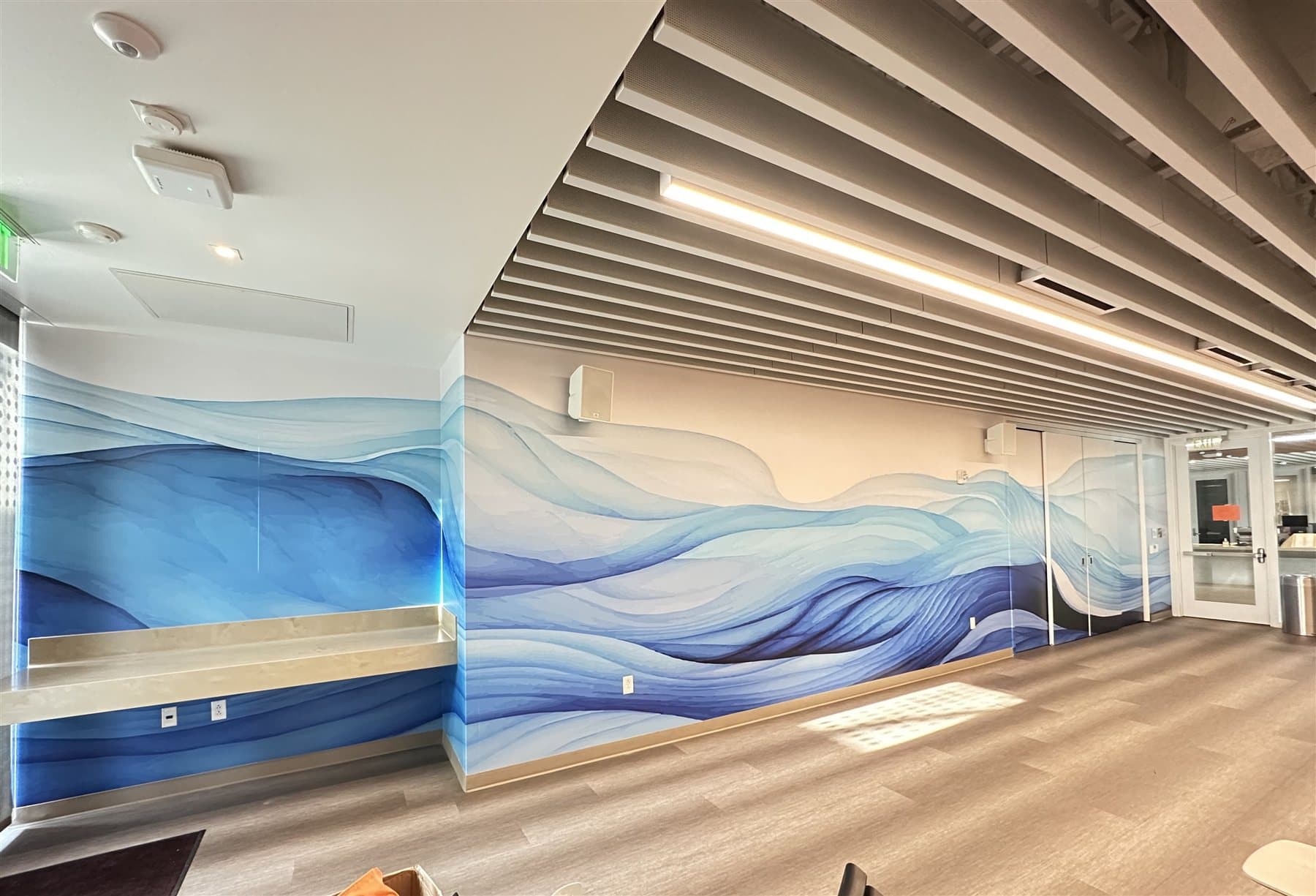 Large format poster production and trimming station